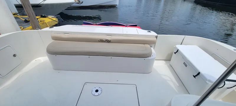  Yacht Photos Pics 2004 Sea Ray 480 Sedan Bridge boat deck with cushioned seating and storage.