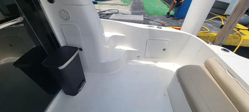  Yacht Photos Pics 2004 Sea Ray 480 Sedan Bridge boat deck with seating and storage compartments.