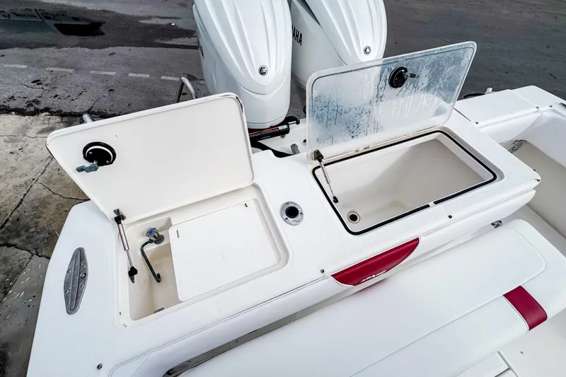  Yacht Photos Pics 2004 SeaVee 340i Cuddy boat with open storage compartments and dual Yamaha engines.