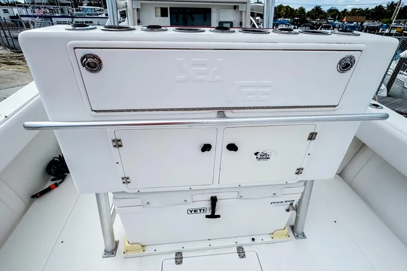  Yacht Photos Pics 2004 SeaVee 340i Cuddy boat deck with storage compartments and Yeti cooler.