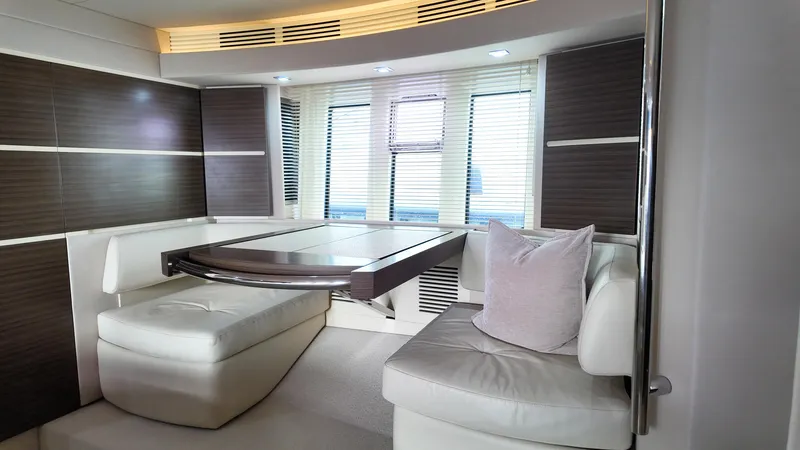  Yacht Photos Pics Luxurious interior of 2015 Azimut 54 Fly yacht with modern seating and table.