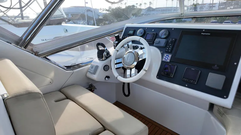  Yacht Photos Pics Helm of 2015 Azimut 54 Fly yacht with modern controls and navigation system.
