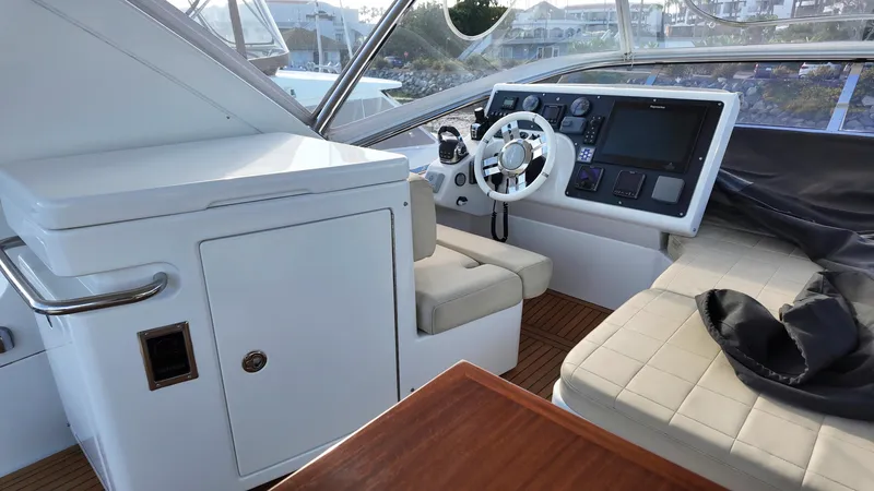  Yacht Photos Pics 2015 Azimut 54 Fly yacht cockpit with modern controls and seating.