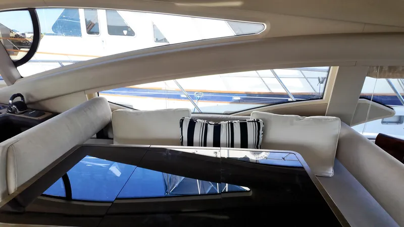  Yacht Photos Pics Interior of 2015 Azimut 54 Fly yacht with elegant seating and striped cushion.