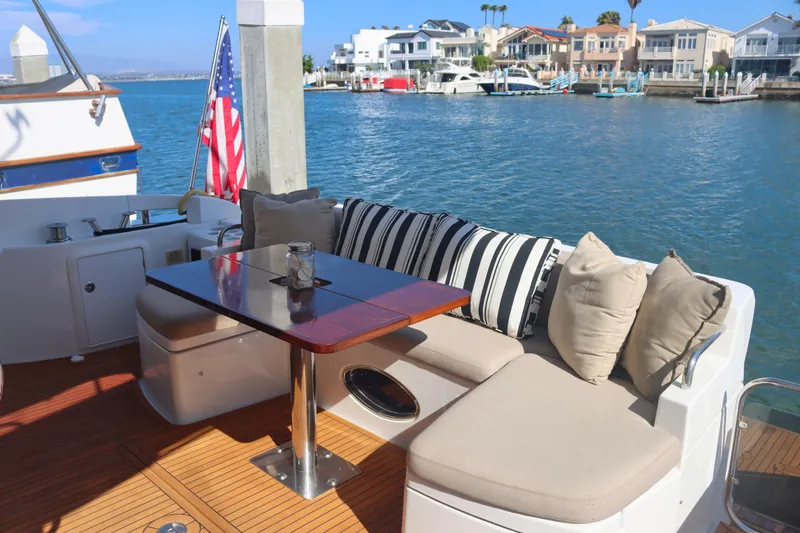  Yacht Photos Pics Luxurious seating area on 2015 Azimut 54 Fly yacht with waterfront view.