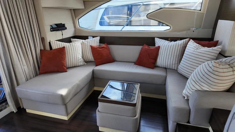  Yacht Photos Pics Luxurious interior of 2015 Azimut 54 Fly yacht with plush seating and stylish cushions.