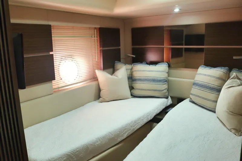  Yacht Photos Pics Luxurious cabin interior of 2015 Azimut 54 Fly yacht with twin beds and elegant decor.