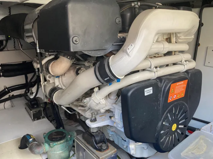  Yacht Photos Pics Engine compartment of a 2015 Azimut 54 Fly yacht, showcasing mechanical components.