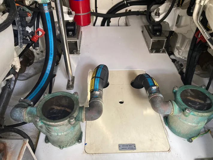  Yacht Photos Pics Engine room of 2015 Azimut 54 Fly yacht showing sea water intake system.