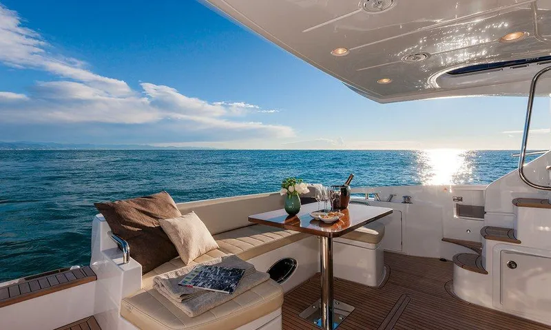  Yacht Photos Pics Luxurious 2015 Azimut 54 Fly yacht interior with ocean view and elegant seating area.