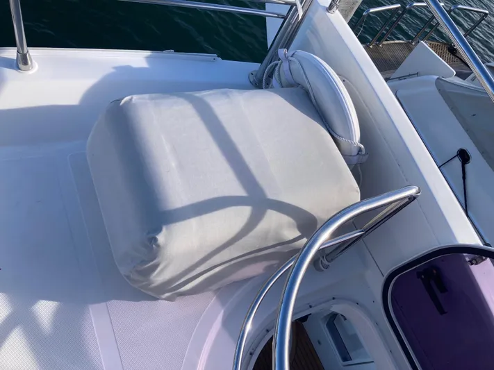  Yacht Photos Pics Cushioned seating area on 2015 Azimut 54 Fly yacht deck.
