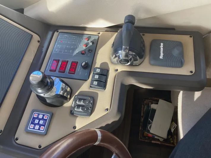  Yacht Photos Pics Control panel of a 2015 Azimut 54 Fly yacht with navigation equipment.