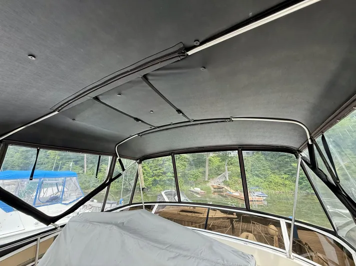  Yacht Photos Pics Interior view of 1997 Silverton 402 Motor Yacht with covered seating area.