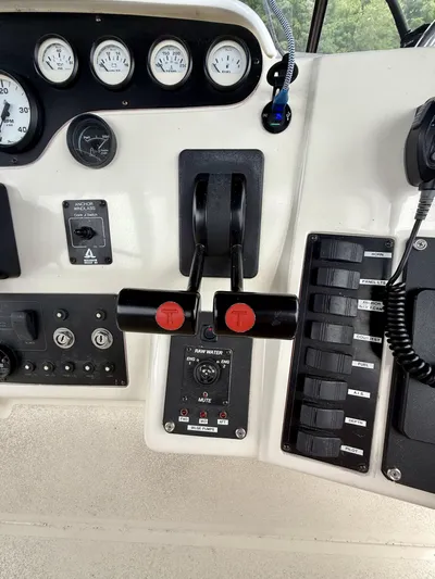  Yacht Photos Pics Control panel of a 1997 Silverton 402 Motor Yacht with gauges and switches.