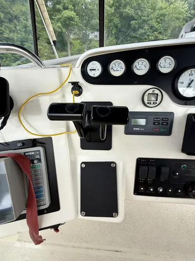  Yacht Photos Pics Control panel of a 1997 Silverton 402 Motor Yacht with gauges and switches.