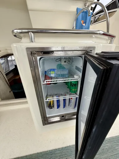  Yacht Photos Pics Mini fridge on 1997 Silverton 402 Motor Yacht stocked with drinks.