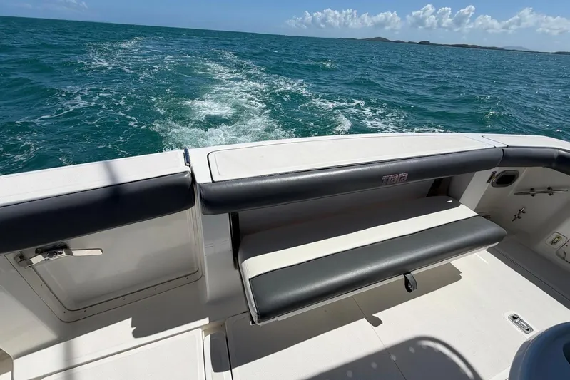  Yacht Photos Pics 1999 Tiara Yachts 4100 Open cruising on blue ocean waters.