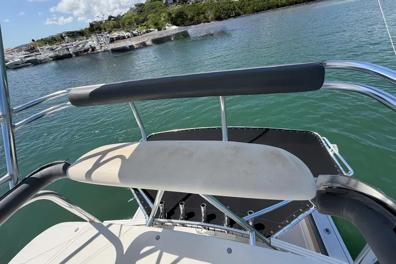  Yacht Photos Pics 1999 Tiara Yachts 4100 Open boat deck overlooking serene marina waters.