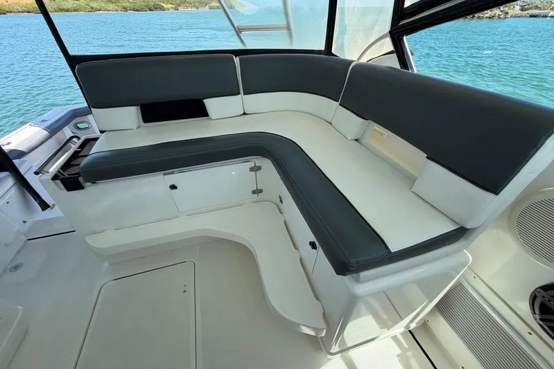  Yacht Photos Pics 1999 Tiara Yachts 4100 Open interior with sleek seating and ocean view.