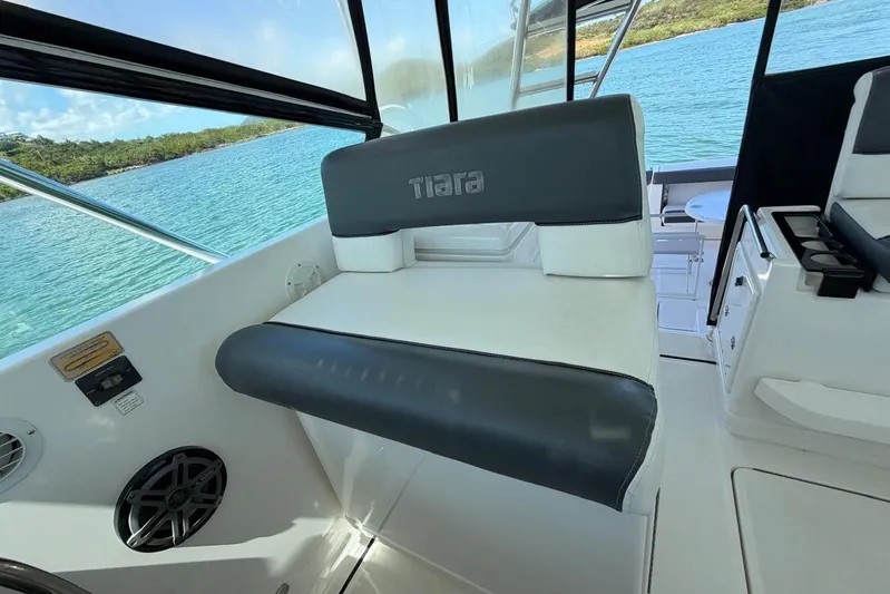  Yacht Photos Pics 1999 Tiara Yachts 4100 Open interior with cushioned seating and scenic water view.