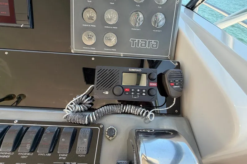  Yacht Photos Pics Control panel of a 1999 Tiara Yachts 4100 Open with Simrad radio equipment.