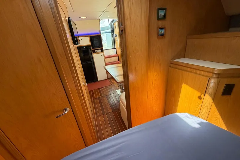  Yacht Photos Pics 1999 Tiara Yachts 4100 Open interior with wood finish and modern amenities.
