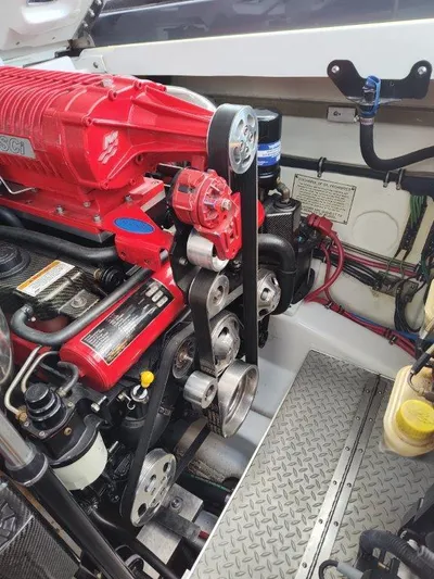  Yacht Photos Pics Engine compartment of a 2015 Formula 382 FASTech boat, showcasing detailed mechanical components.