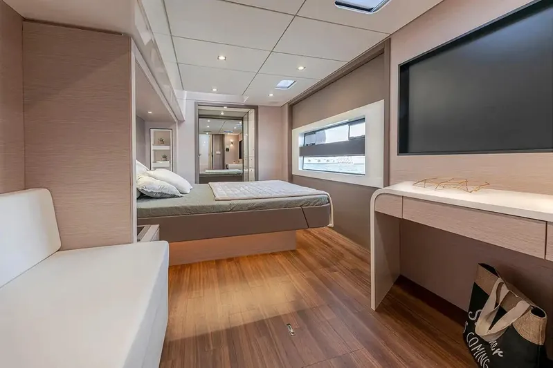  Yacht Photos Pics Luxurious interior of 2026 Aventura 56 MY yacht, featuring modern bedroom design and elegant furnishings.
