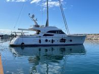 2005 Mochi Craft Dolphin 74