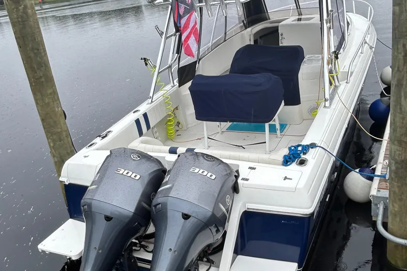  Yacht Photos Pics 2003 Intrepid 310 Walkaround boat docked with twin 300 horsepower engines.