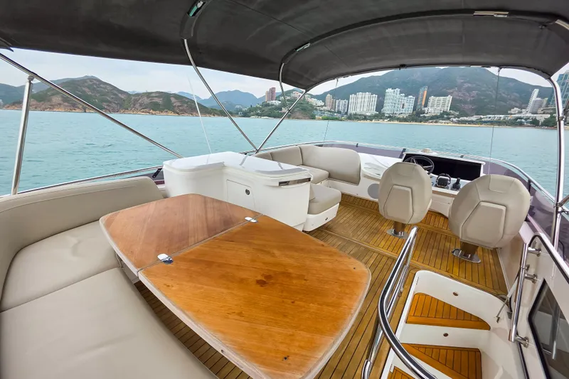  Yacht Photos Pics Luxurious 2019 Princess F45 yacht interior with scenic coastal view.