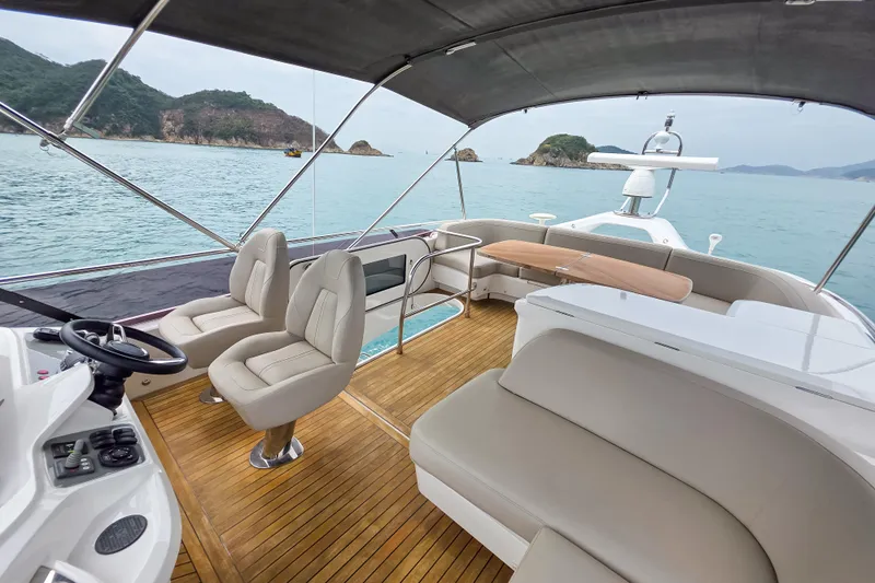  Yacht Photos Pics Luxurious 2019 Princess F45 yacht interior with elegant seating and scenic ocean view.