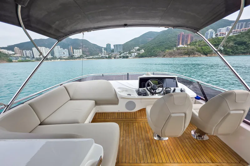  Yacht Photos Pics Luxurious 2019 Princess F45 yacht interior with scenic coastal view.