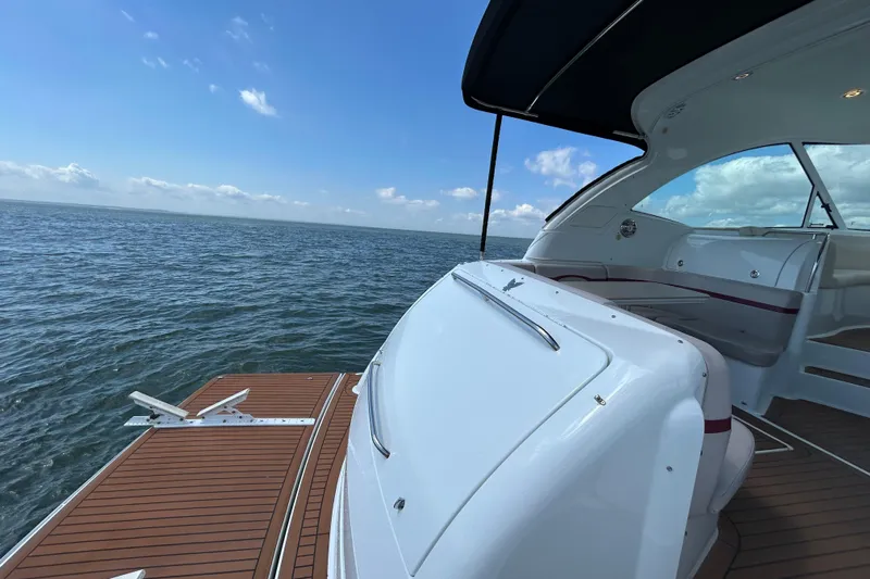  Yacht Photos Pics 2009 Formula 45 Yacht on open water, showcasing sleek design and luxurious deck.