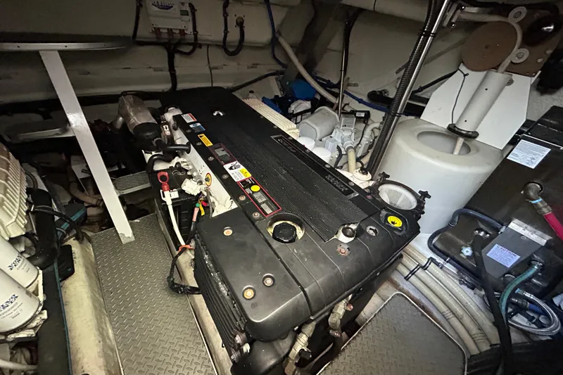  Yacht Photos Pics Engine room of a 2009 Formula 45 Yacht, showcasing mechanical components and wiring.