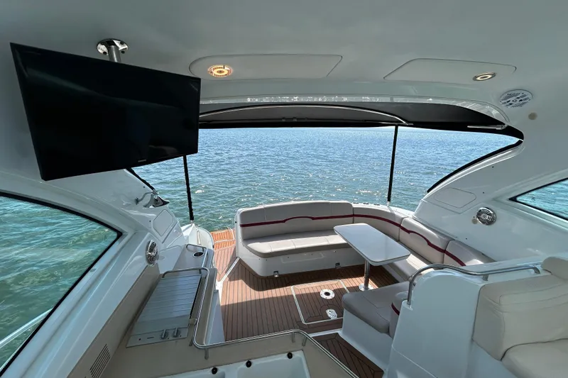  Yacht Photos Pics Interior of 2009 Formula 45 Yacht with seating, table, and ocean view.
