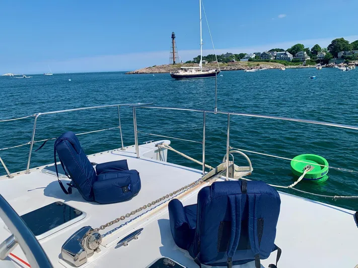 Tranquility Base Yacht Photos Pics Deck view from 2003 PDQ-34 boat, overlooking ocean and lighthouse.