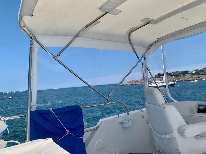 Tranquility Base Yacht Photos Pics Boat interior view with ocean backdrop, featuring PDQ-34 model, 2003.