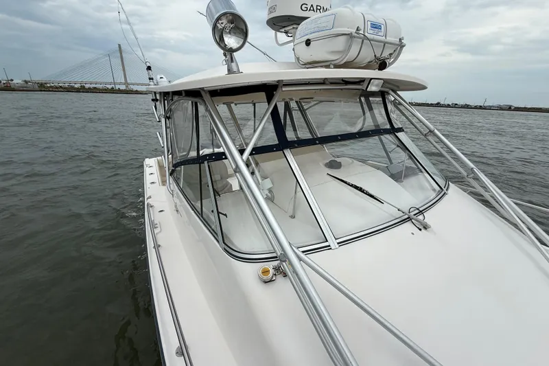 Get Bent Yacht Photos Pics 2005 Grady-White Express 330 boat on water, featuring sleek design and sturdy construction.