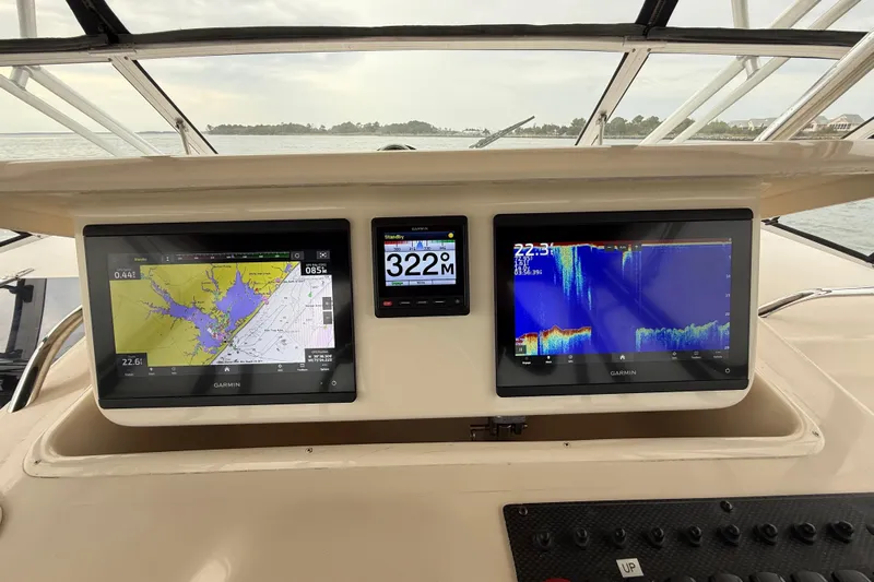 Get Bent Yacht Photos Pics Dashboard of a 2005 Grady-White Express 330 with Garmin navigation displays.