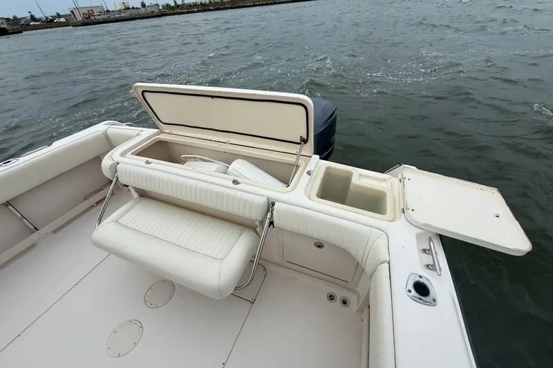 Get Bent Yacht Photos Pics 2005 Grady-White Express 330 boat with open storage compartments on deck.