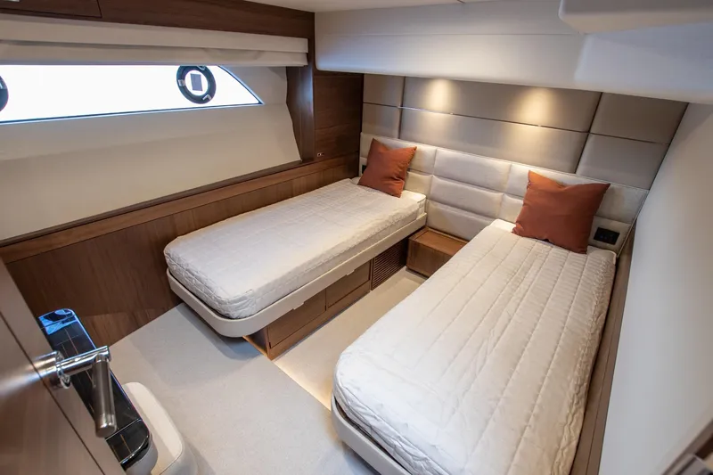 Mc Yacht Photos Pics Luxurious twin bedroom in 2021 Princess Y78 Motor Yacht with modern design and cozy ambiance.