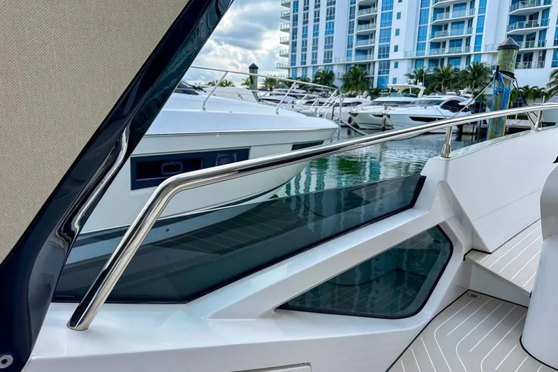  Yacht Photos Pics 2023 Azimut Verve 47 yacht docked in marina, sleek design with modern railings.