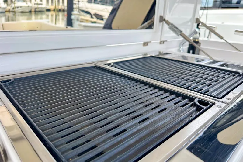 Yacht Photos Pics Outdoor grill on 2023 Azimut Verve 47 yacht, docked at marina.