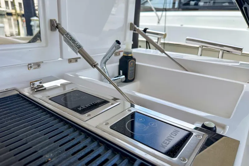 Yacht Photos Pics Outdoor kitchen on 2023 Azimut Verve 47 yacht with Kenyon grill and sink.