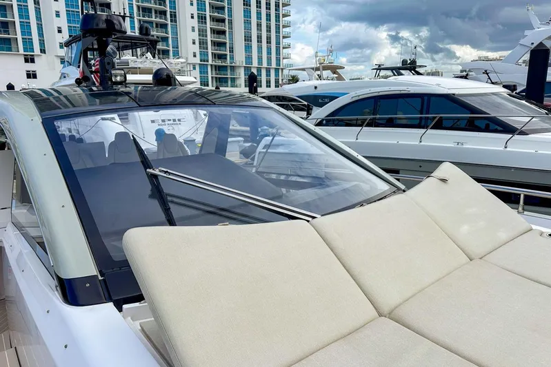  Yacht Photos Pics 2023 Azimut Verve 47 yacht with luxurious deck, docked at marina.