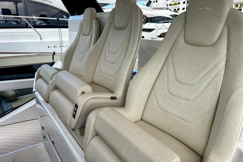  Yacht Photos Pics Luxurious seating on the 2023 Azimut Verve 47 yacht, featuring elegant beige upholstery.