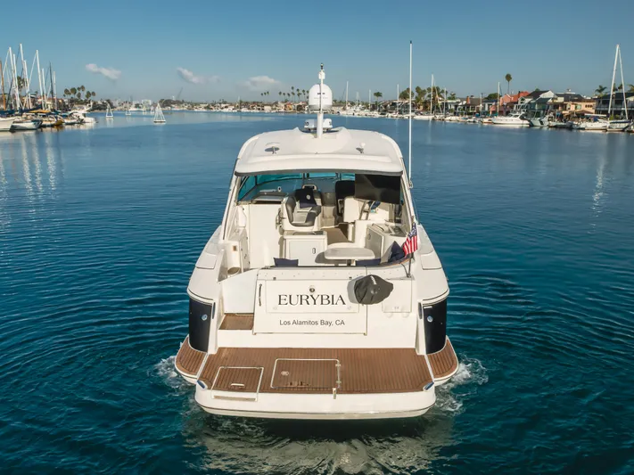 Eurybia Yacht Photos Pics 2006 Cruisers Yachts 420 Express on calm water, rear view.