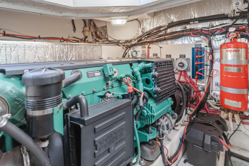 Eurybia Yacht Photos Pics Engine room of 2006 Cruisers Yachts 420 Express, featuring a well-maintained marine engine.