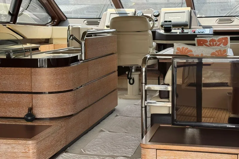  Yacht Photos Pics Luxurious interior of a 2012 Azimut 60 yacht with modern amenities and elegant design.